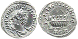 A picture containing coin, object

Description automatically generated
