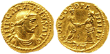 A couple of gold coins

Description automatically generated with medium confidence